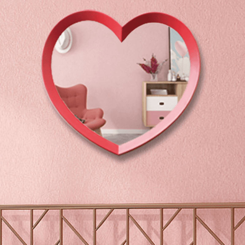 Espejo de pared moderno en forma de corazón rojo.